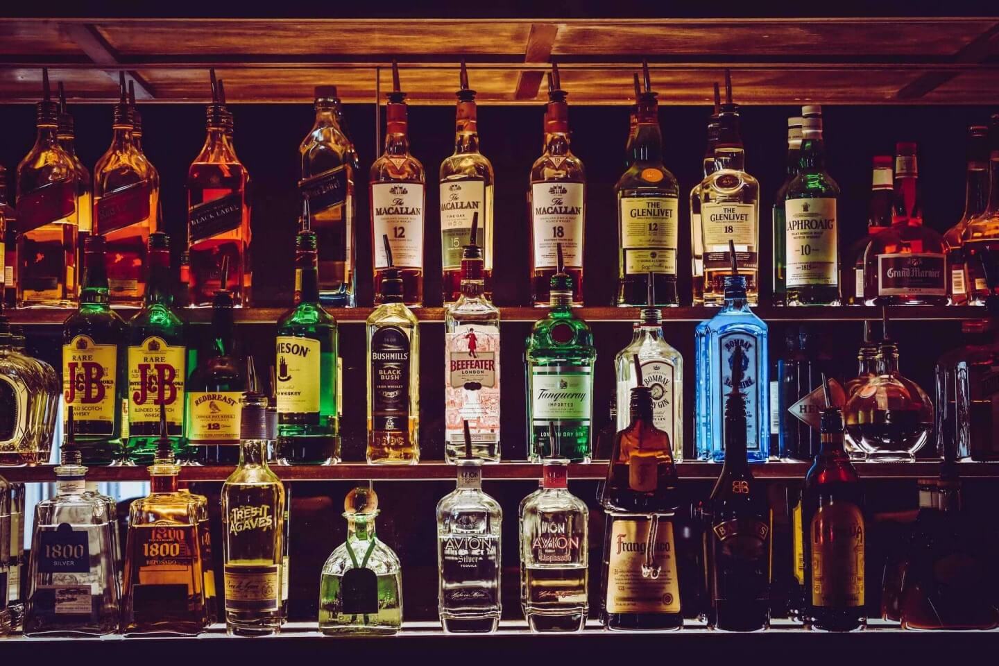 Premium liquor bottles and glasses at Liquor Pap